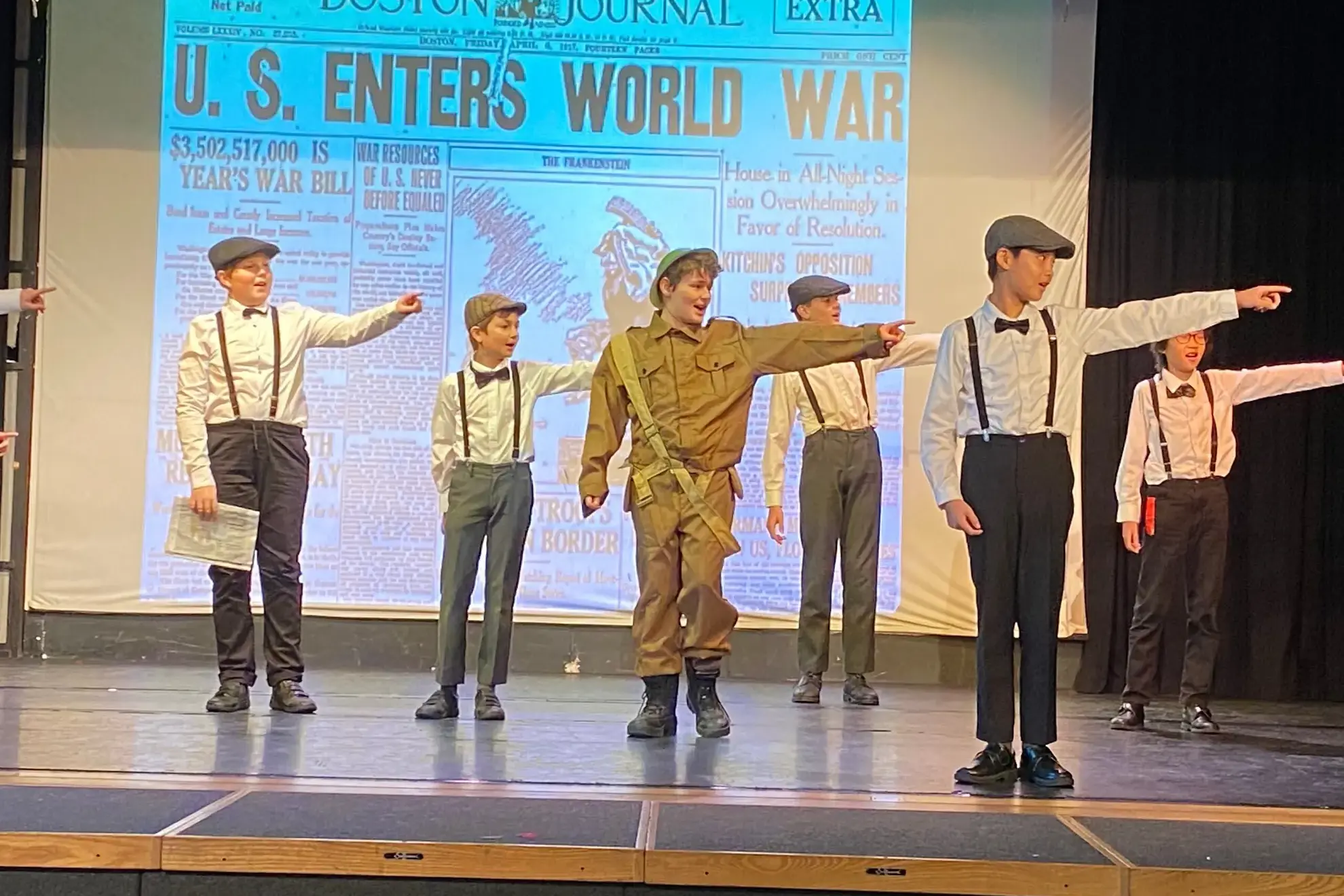 Students performing on stage