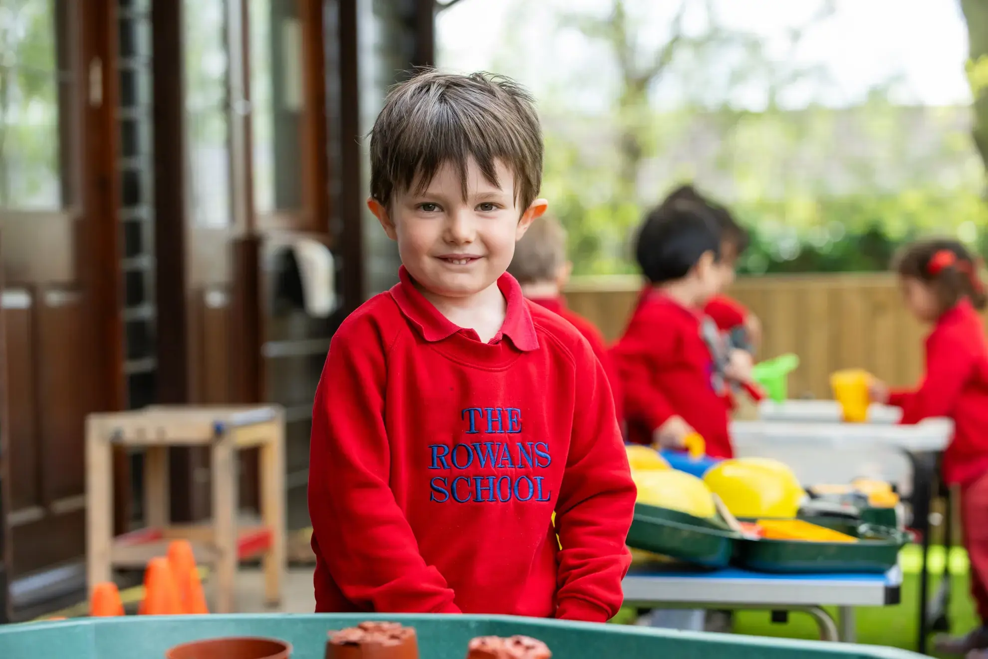 Student smiling at camera