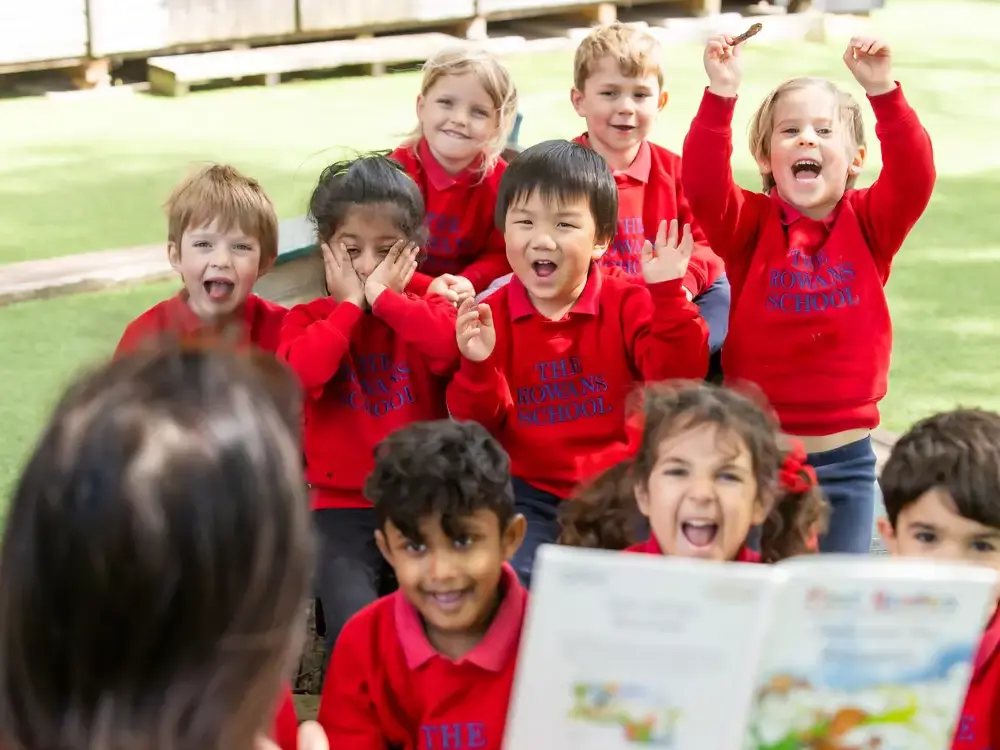 Group of children outside cheering
