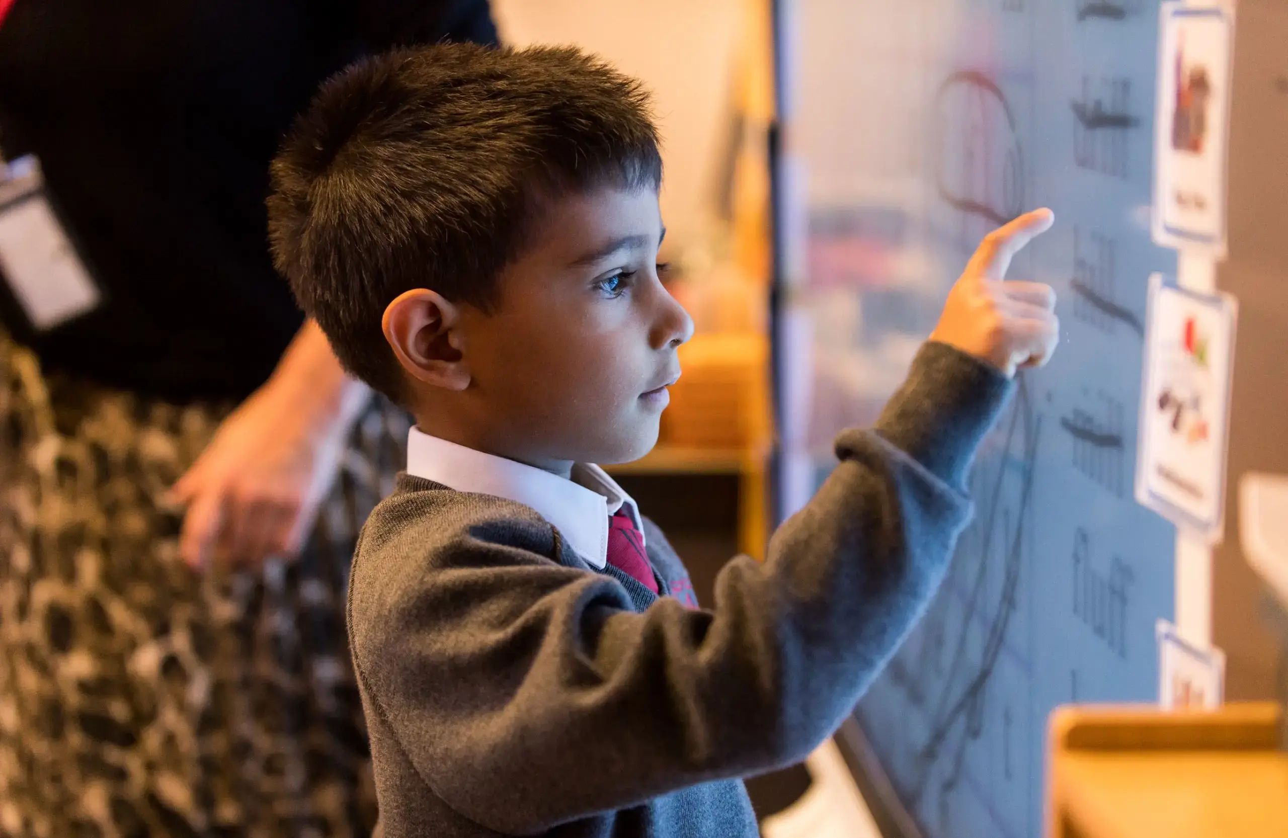 Student using touch screen for school work
