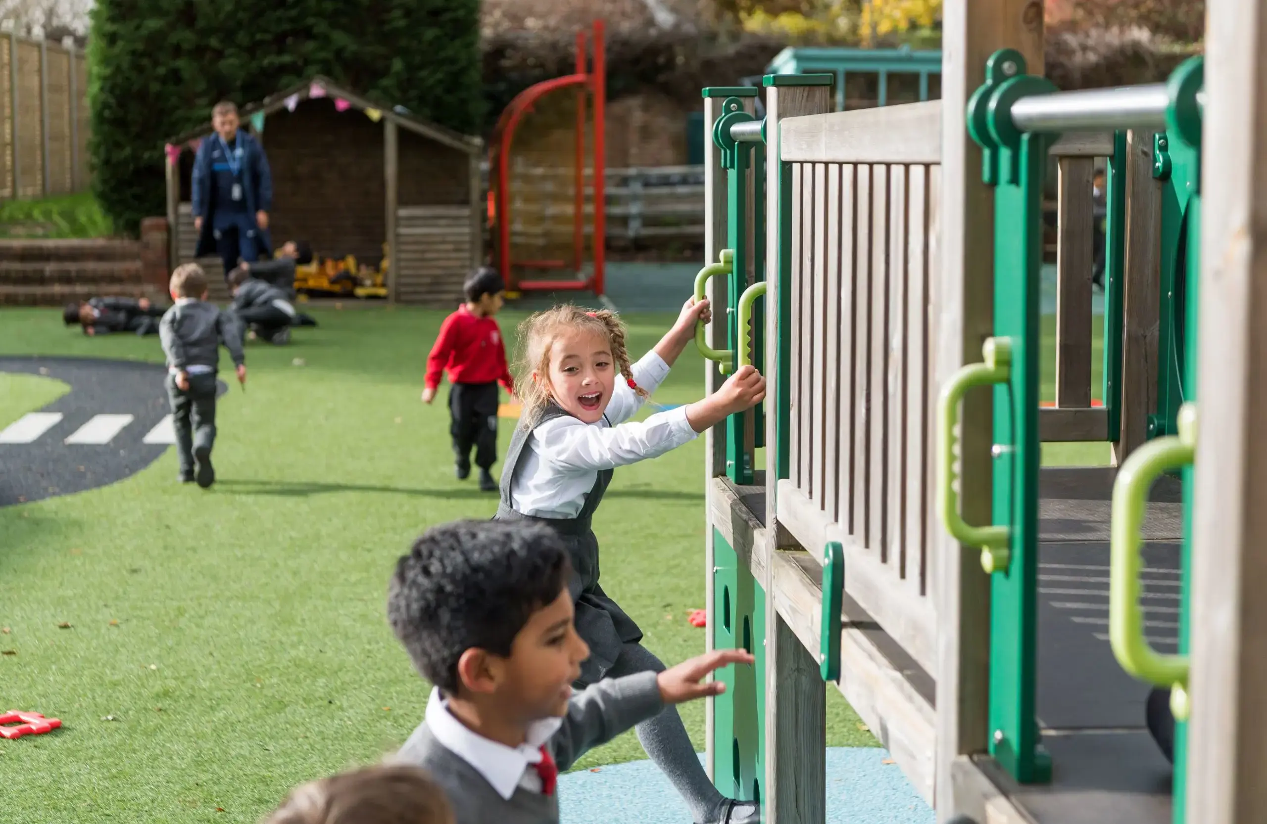 Shrewsbury House Pre-prep students playing on climbing frame