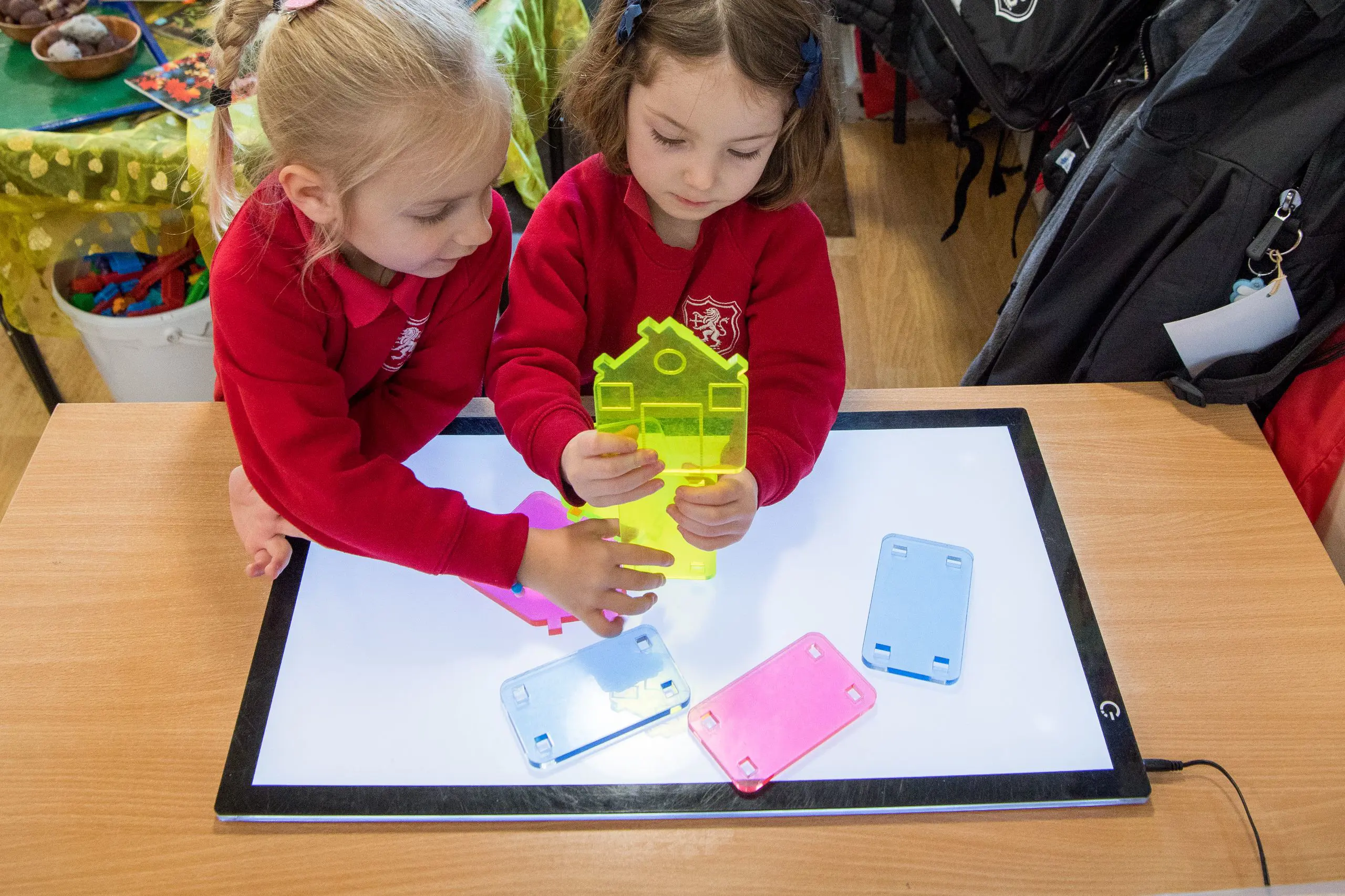 Students working together on a buiding project