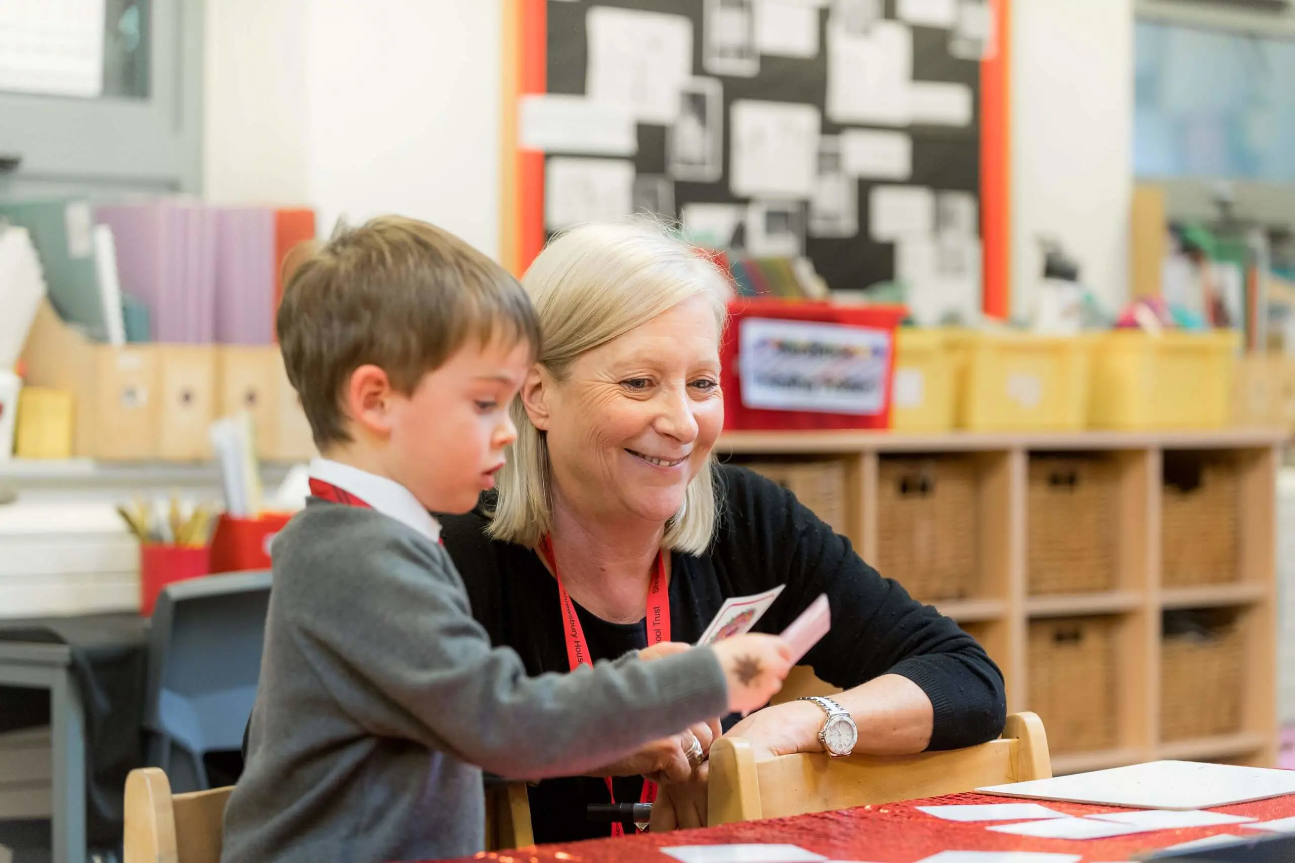Shrewsbury House Pre-Prep teacher helping a student in a lesson
