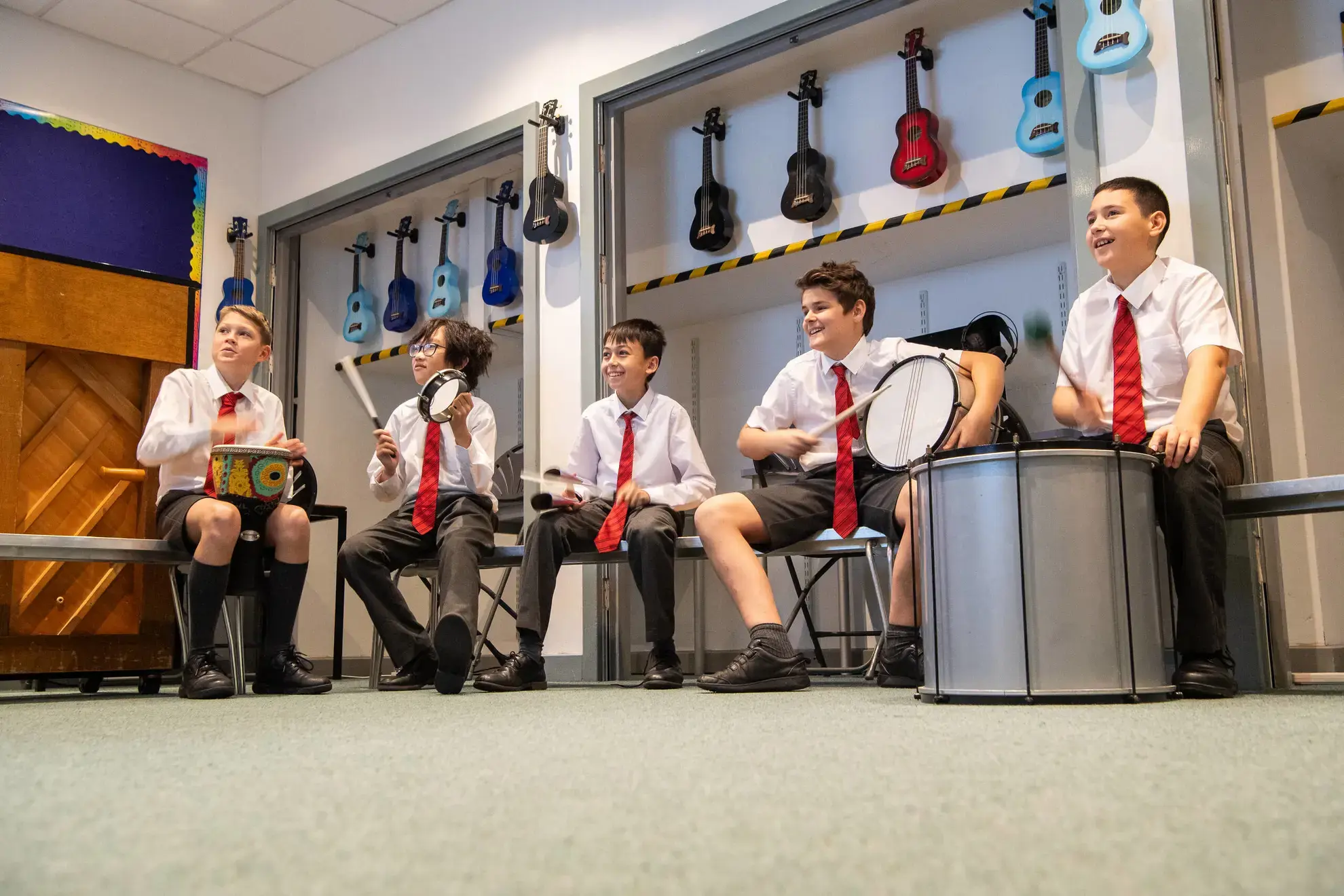 Students playing drums
