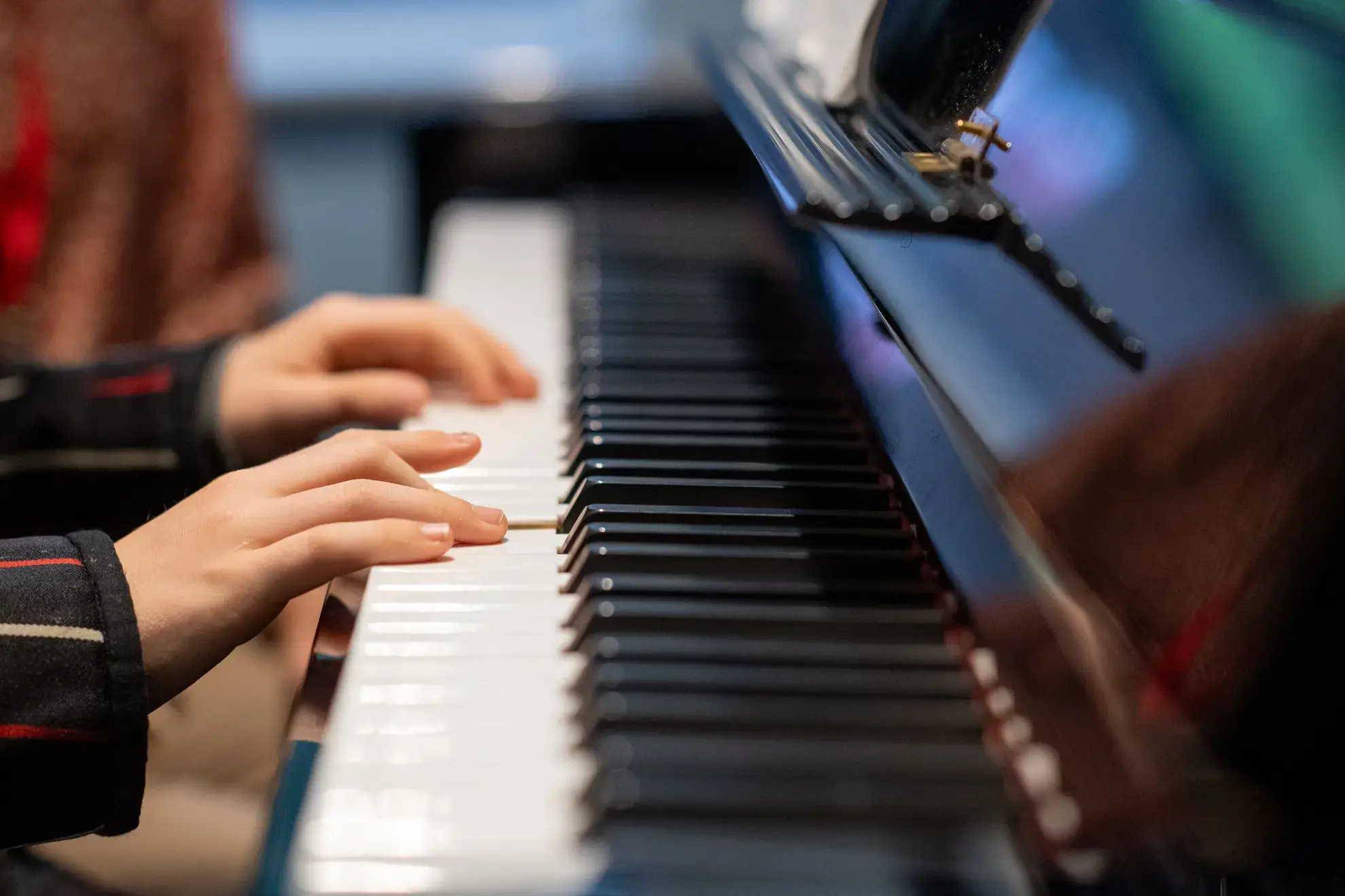 Student playing piano