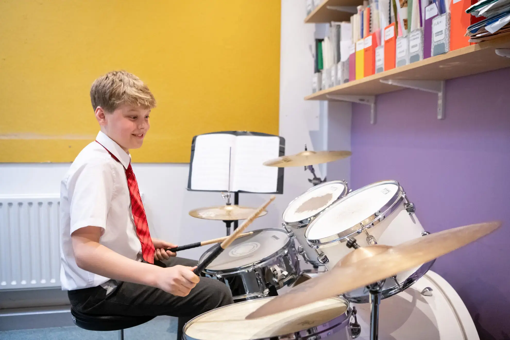 Student playing drums