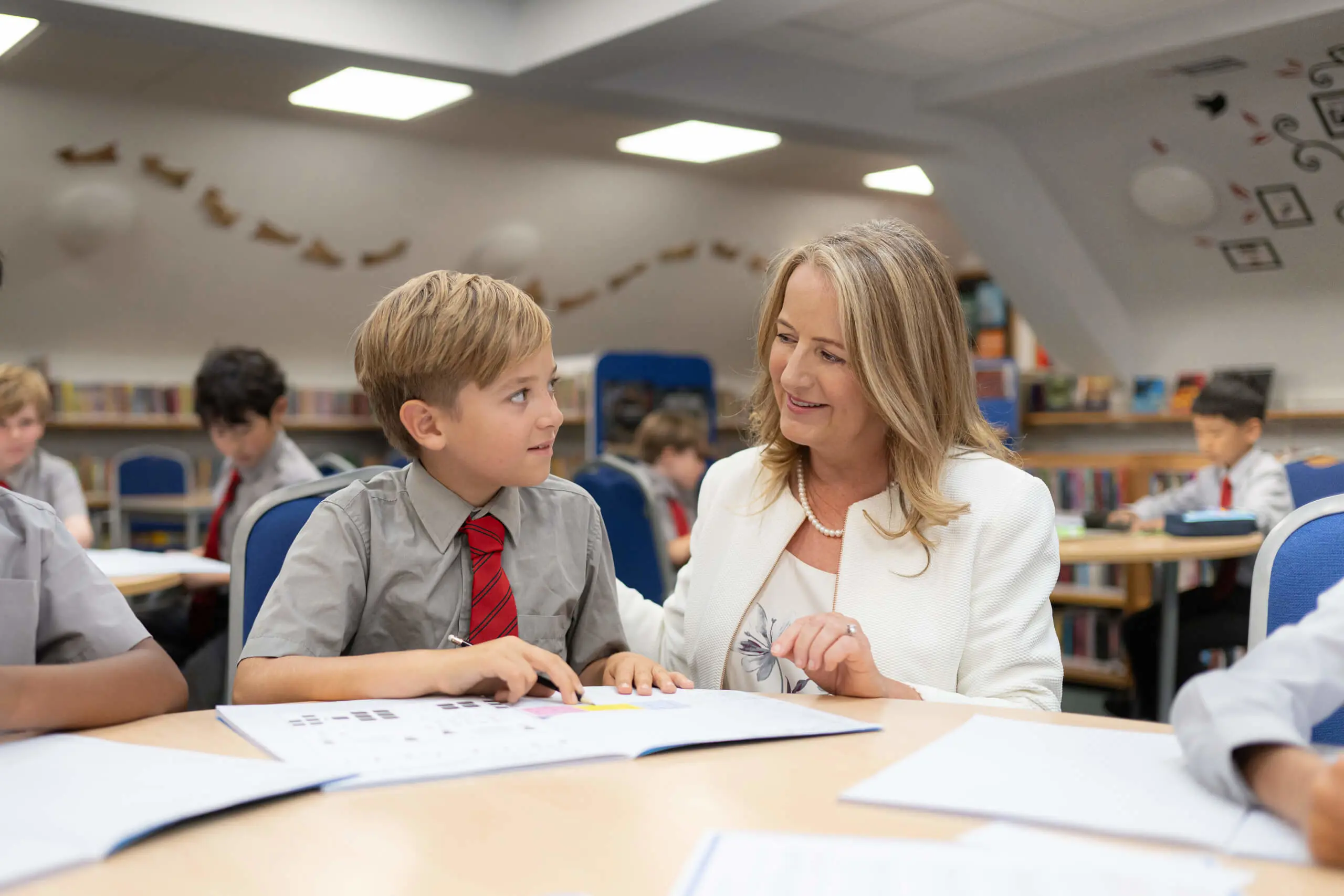 Headteacher of top private school in surrey with pupil
