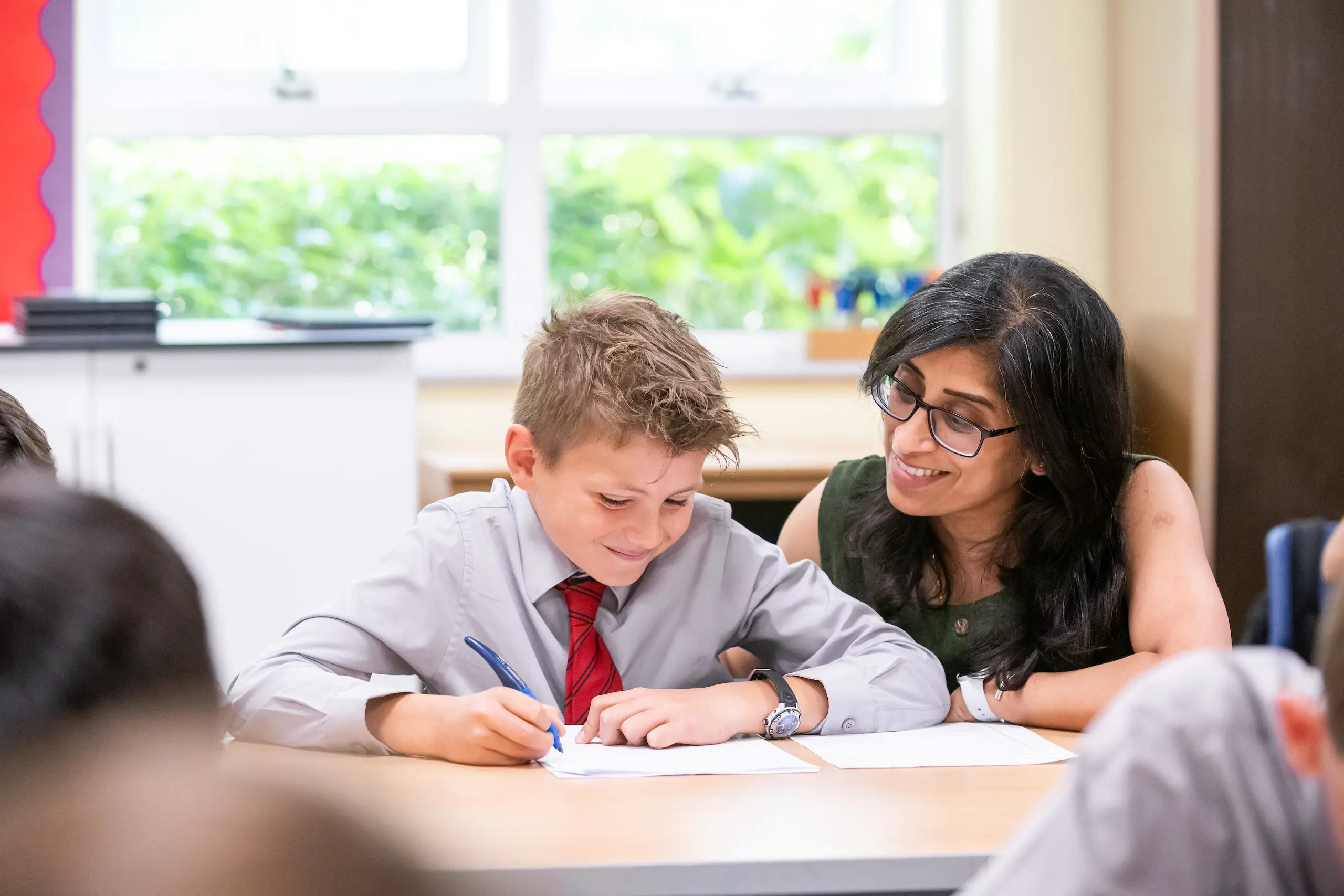 Teacher teaching students