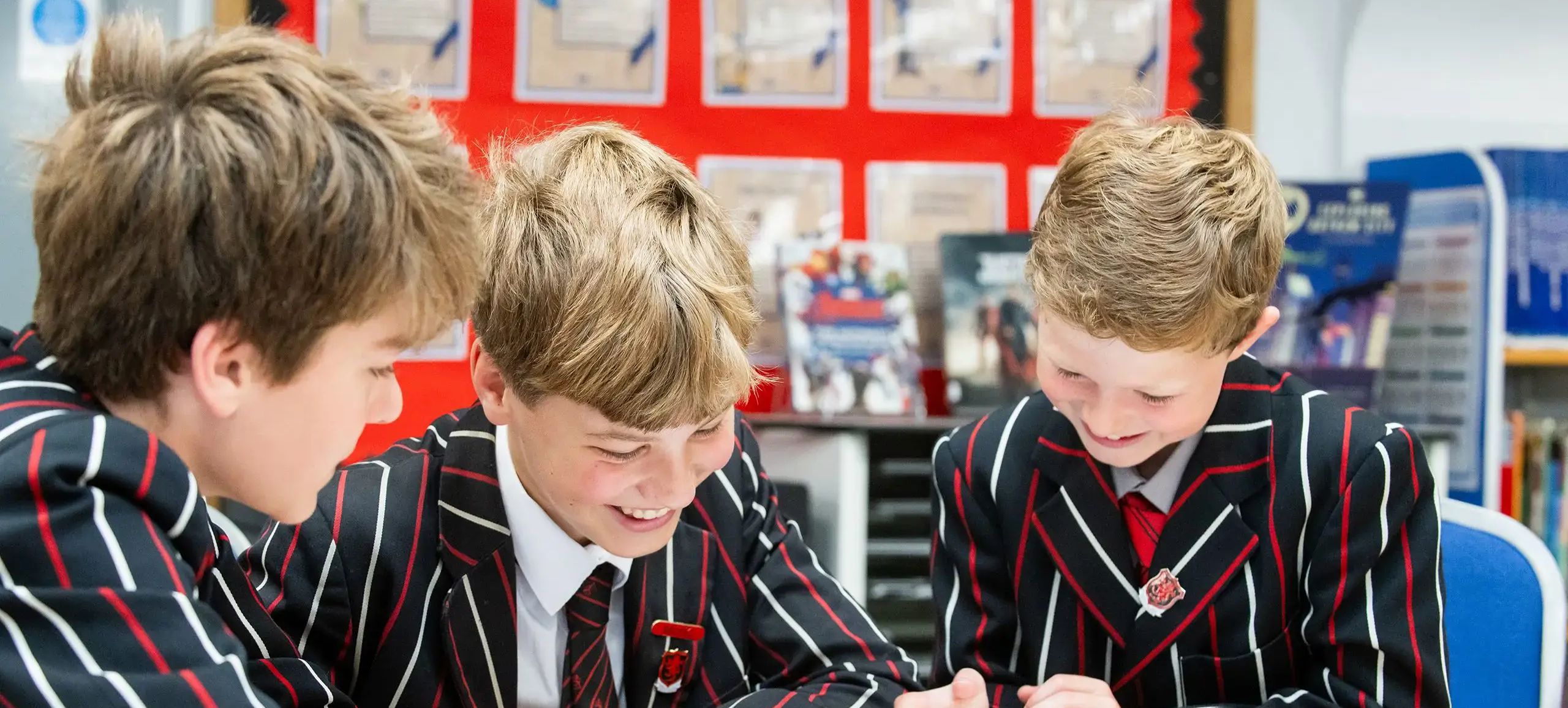 Three students in classroom