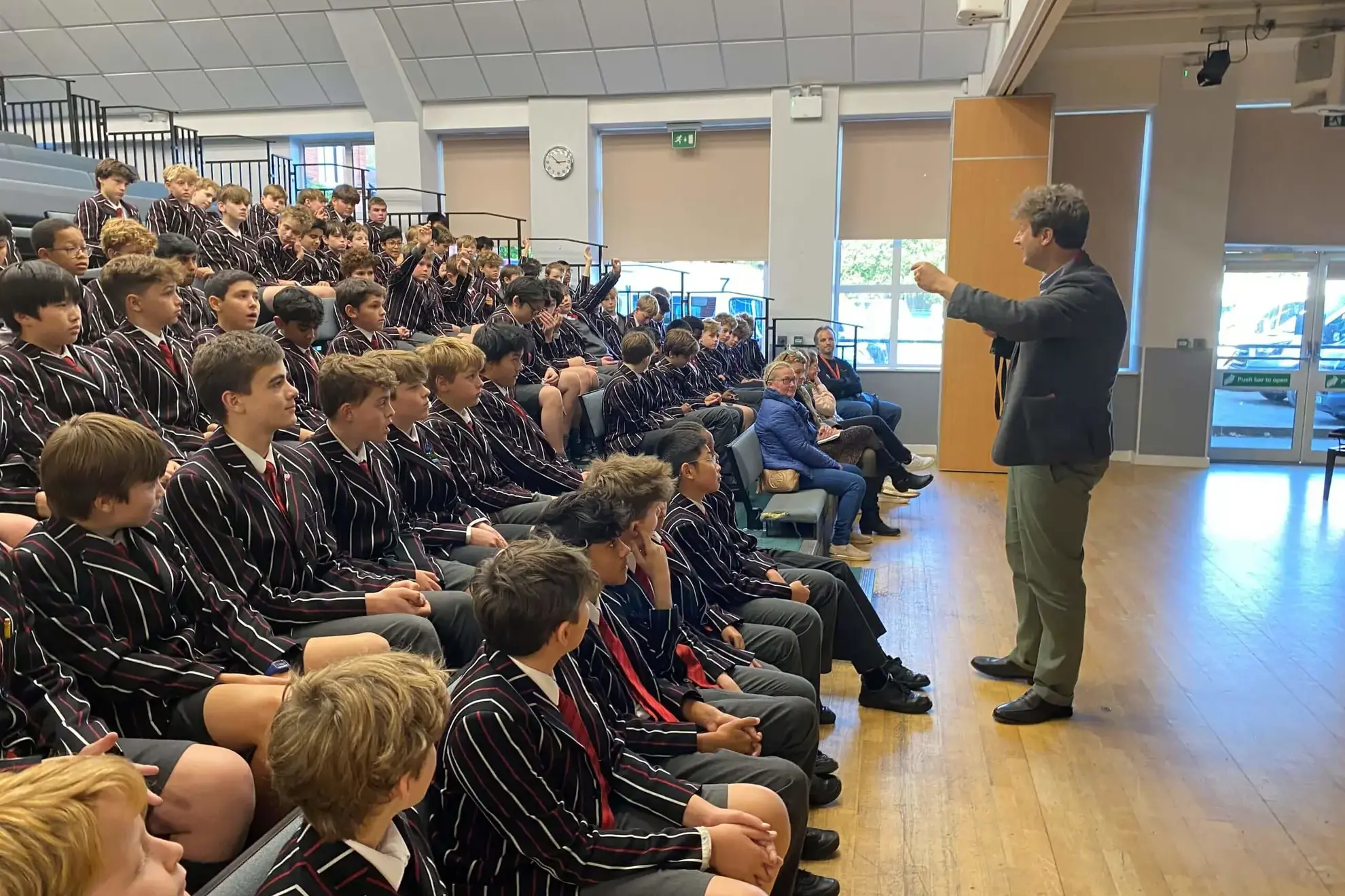 Teacher talking to students during a presentation